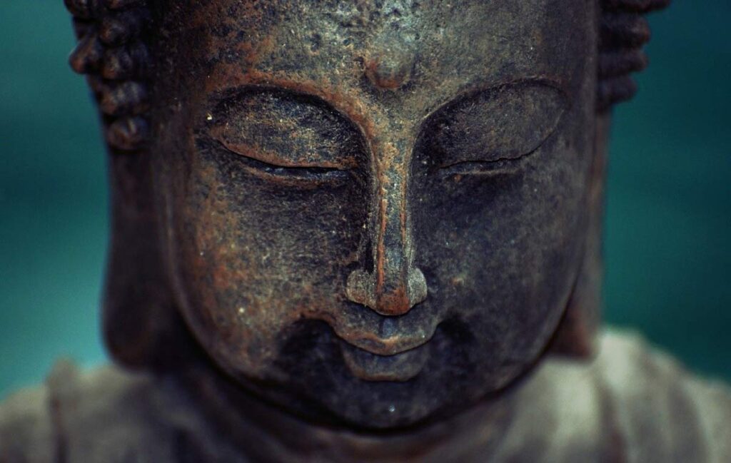 Buddha calmly meditating for spiritual awakening and enlightenment
